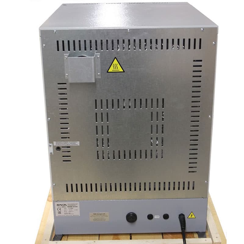 Rear of a SNOL 300°C forced air laboratory oven showing ventilation openings and electrical connection.