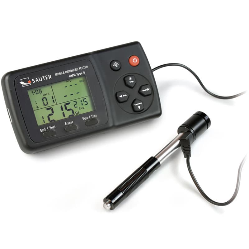 A black Sauter mobile hardness tester displaying "1212 HL," connected to a metallic probe with a cable.