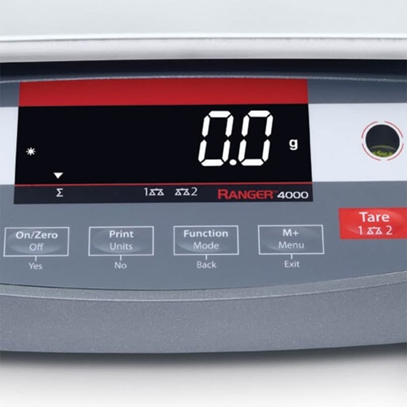Close-up of Ohaus Ranger 4000 digital display with function keys and tare button.
