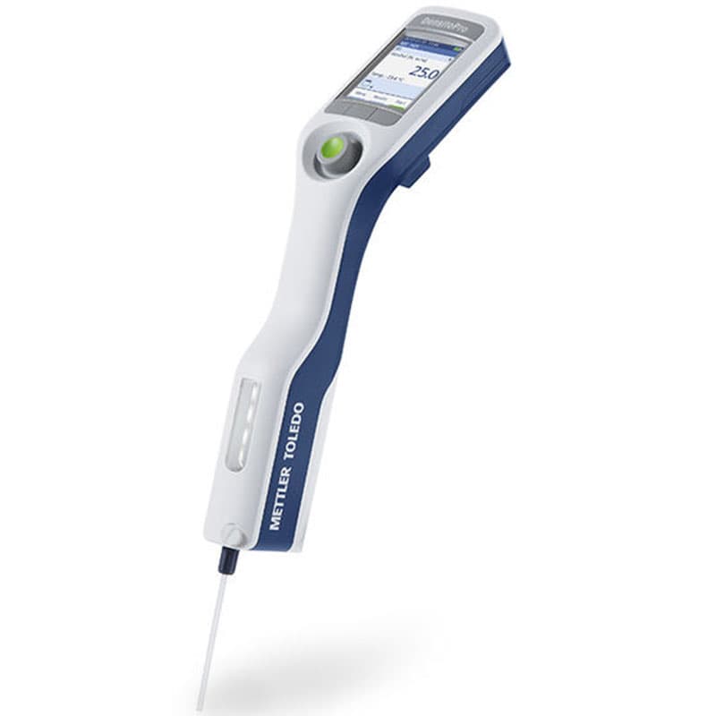 A Mettler Toledo handheld digital pipette with a white and blue ergonomic design, a touchscreen display showing 250 µL, and a thin pipette tip for precise liquid dispensing.