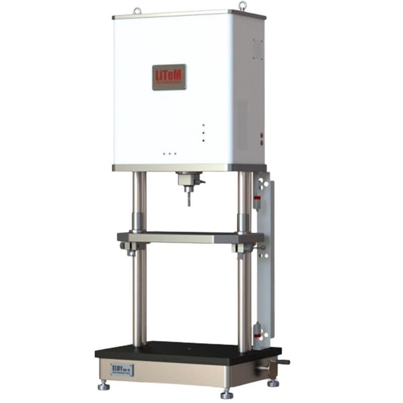 LiTeM ELDY 100 fatigue testing machine with enclosed actuator unit, dual vertical guide columns, adjustable crosshead, and base platform for cyclic material fatigue testing.