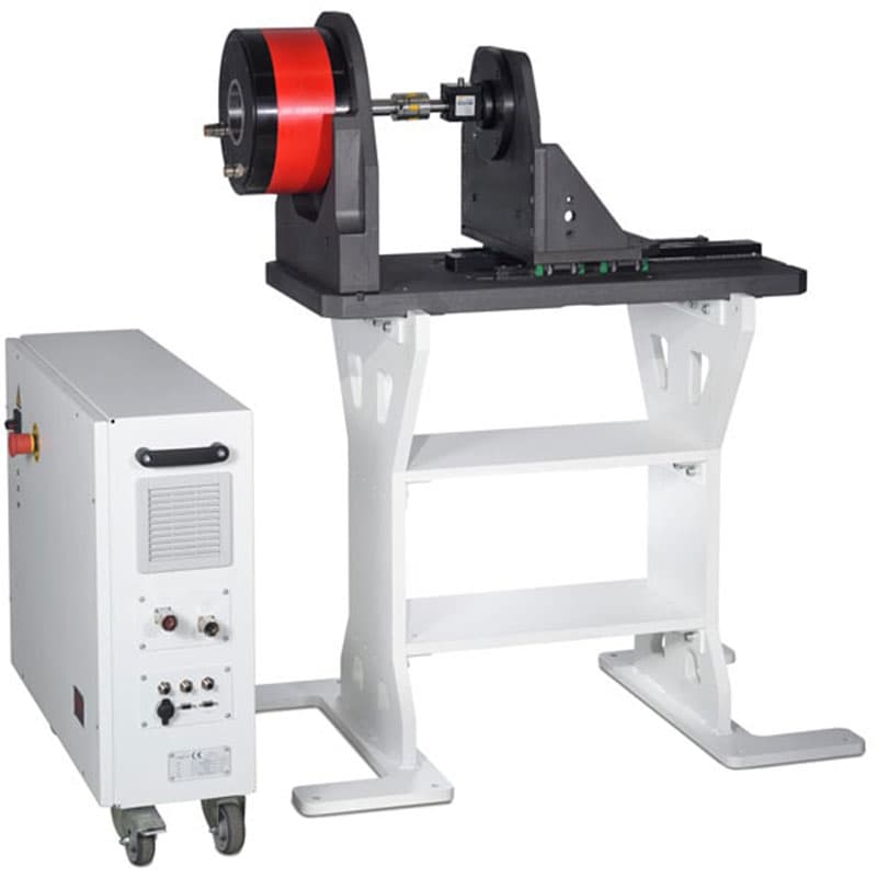 NewTOR torsion testing machine with rotary actuator and external control cabinet for precision torque testing of mechanical components.