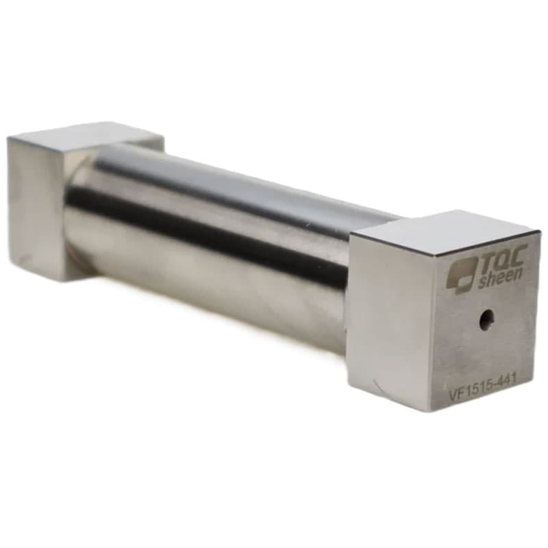 Angled view of a TQC Sheen instrument, highlighting the logo and the precise hole on the square end.