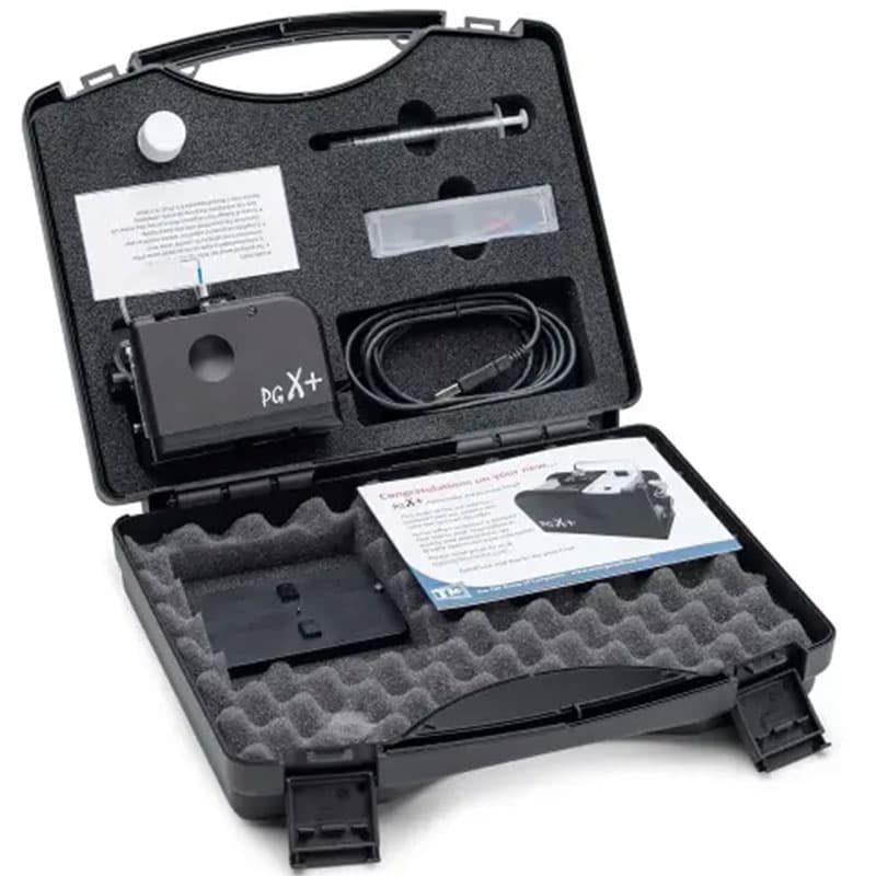 Carrying case for PGX+ contact angle meter, featuring a foam-lined interior with the device, cables, syringes, and accessories securely stored.