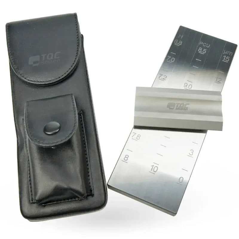 TQC Sheen wet film thickness gauge with engraved scales and a black protective leather pouch for secure storage.