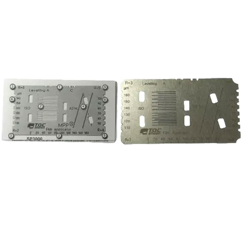 Two TQC Sheen metal templates with leveling scales, ISO and ASTM markings, designed for professional paint application and testing.