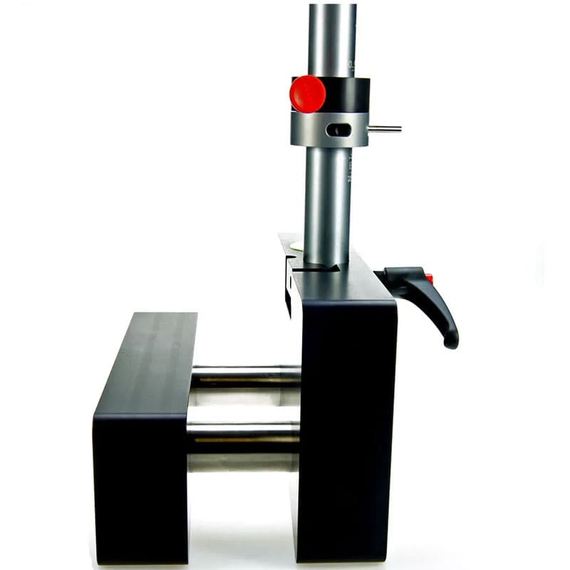 Side view of TQC Sheen adhesion tester with a sturdy black base, adjustable rod, and ergonomic handle for precision alignment.