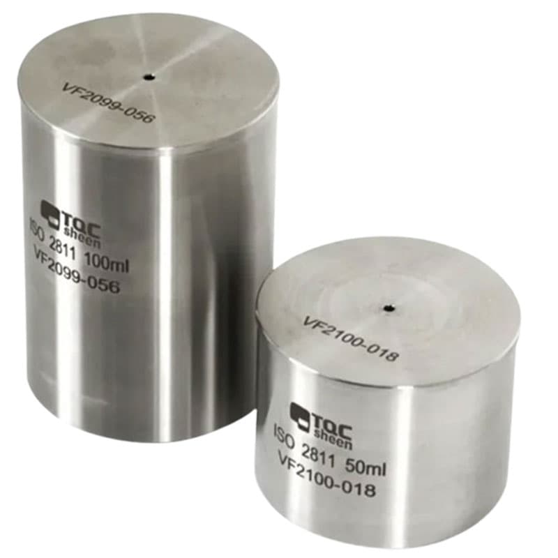 Two stainless steel TQC Sheen pycnometers, 100 ml and 50 ml, compliant with ISO 2811 standards, for density measurement of liquids and solids.