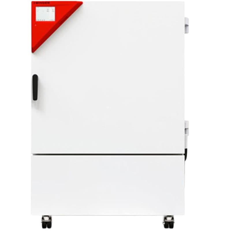 Compact white industrial testing chamber with a single door, red triangular control panel, and caster wheels.