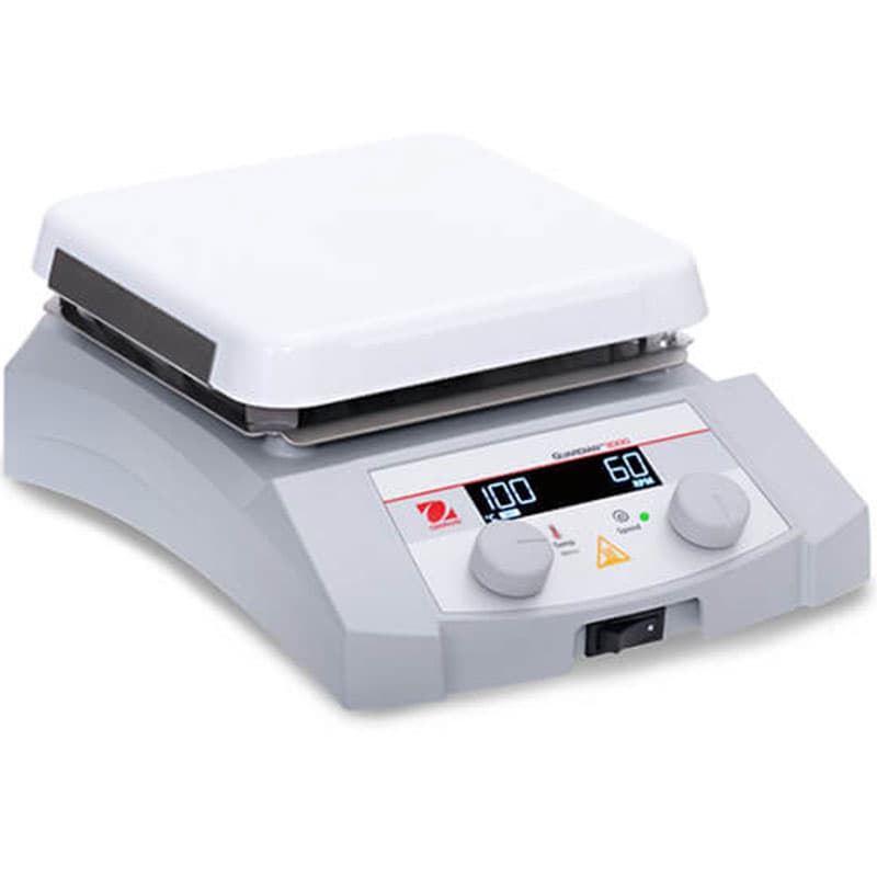 Angled view of OHAUS Guardian 3000 hotplate stirrer with square ceramic top and digital control panel.