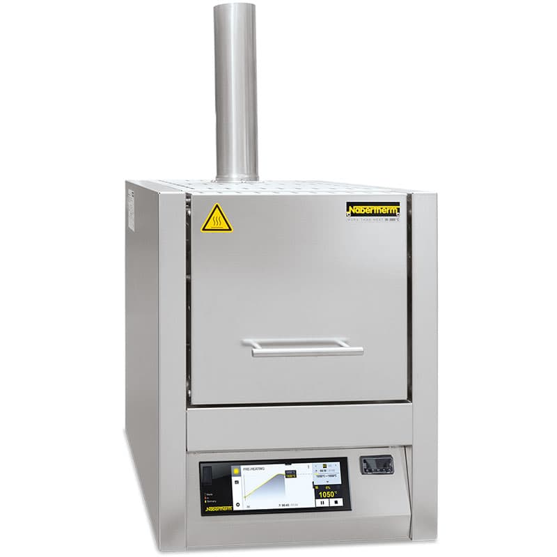 Laboratory ashing furnace with front door, exhaust chimney, and digital touchscreen temperature control.