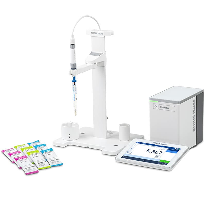 Mettler Toledo NineFocus NF2000 HA pH meter kit with chemically resistant pH electrode, electrode stand, touchscreen display, control unit, and pH calibration buffer sachets for hydrofluoric acid and corrosive sample testing.