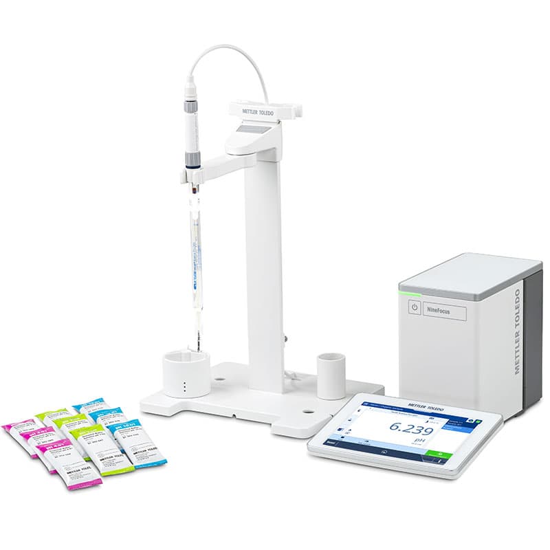 Mettler Toledo NineFocus NF2000 organic pH meter kit with pH electrode, electrode stand, touchscreen display, control unit, and pH buffer sachets for laboratory organic solvent pH analysis.