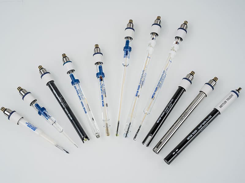 Collection of METTLER TOLEDO laboratory pH and electrochemical sensors arranged side by side on a white background.