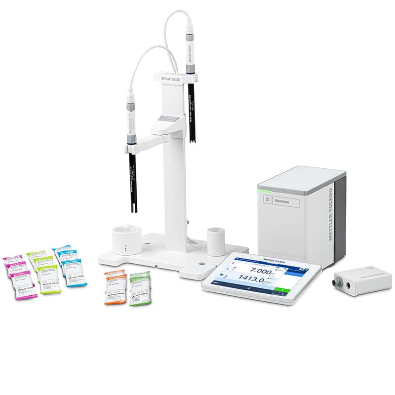 NineFocus NF2300 pH and conductivity meter kit with dual probes, touchscreen display, and calibration buffer packets.