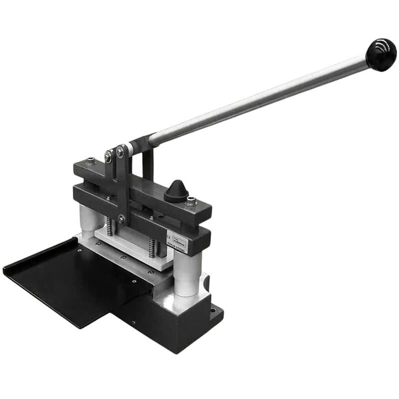 Manual punch die press with long lever handle and rectangular cutting base.