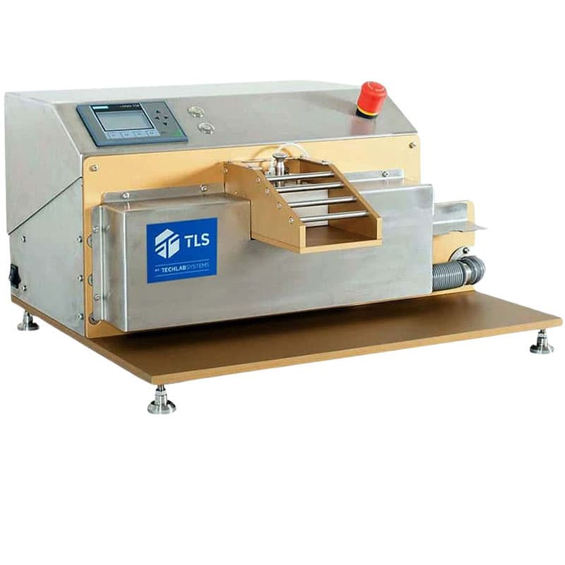 ECT Saw Cutter SS-25 machine with feed tray, control panel, and emergency stop button.