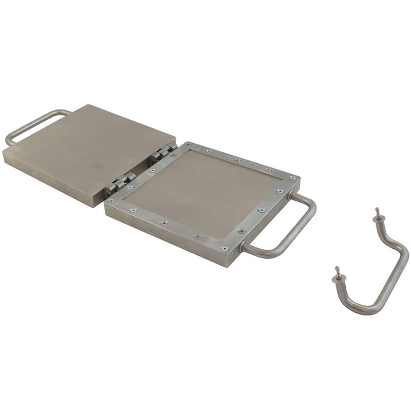 Open THS1390 mould with recessed cavity and detached handle components beside it.