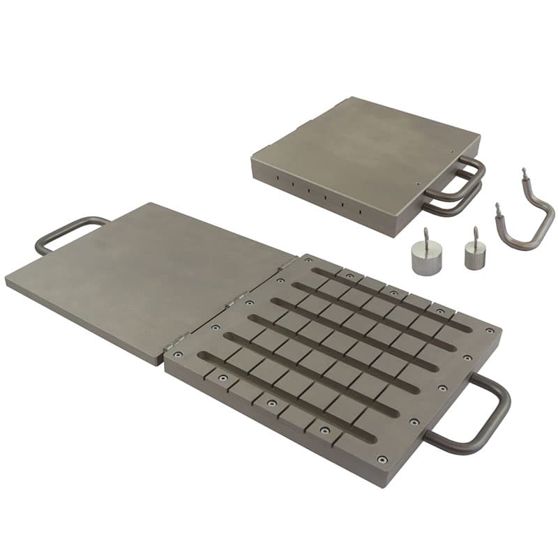 THS1390 mould open with slotted plate and separate lid section placed nearby.