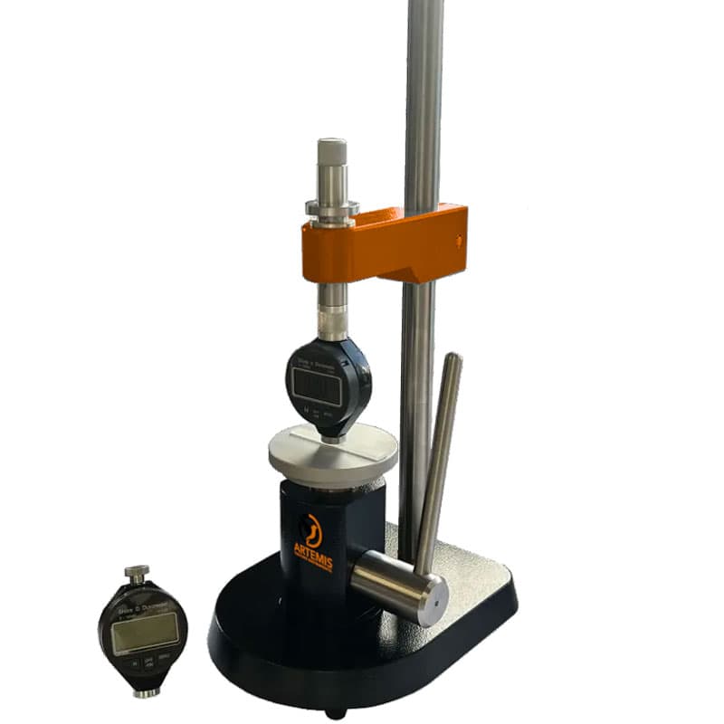 Artemis durometer test stand with digital durometer, adjustable mounting arm and sample platform for Shore hardness testing.