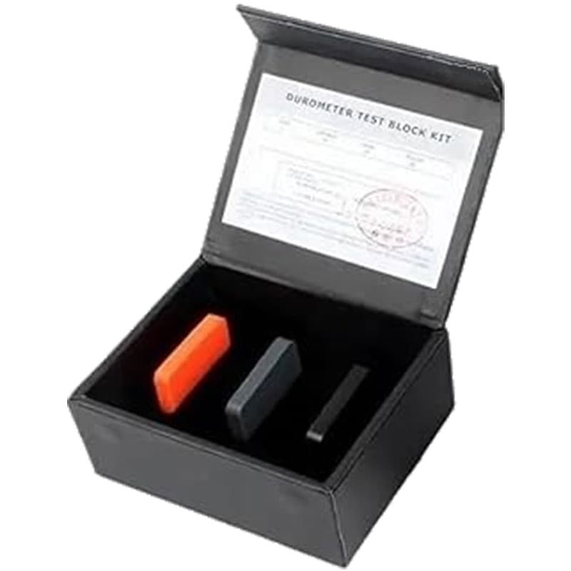 Shore D durometer reference block kit with three hardness test blocks supplied in a protective black storage case.