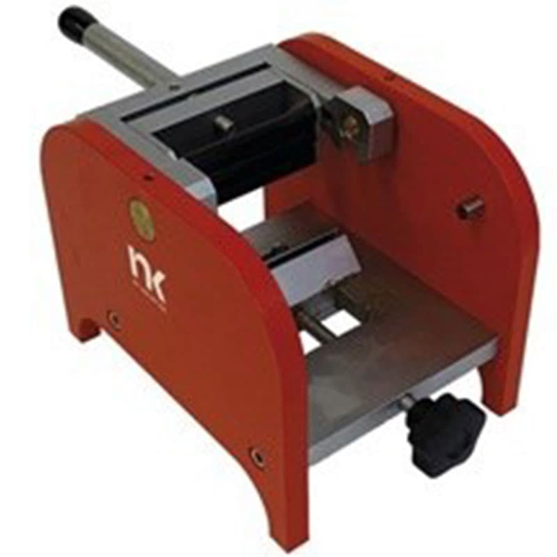 NEURTEK Cylindrical Mandrel Bend Tester with red metal frame, manual operating handle and interchangeable mandrels for coating flexibility testing.