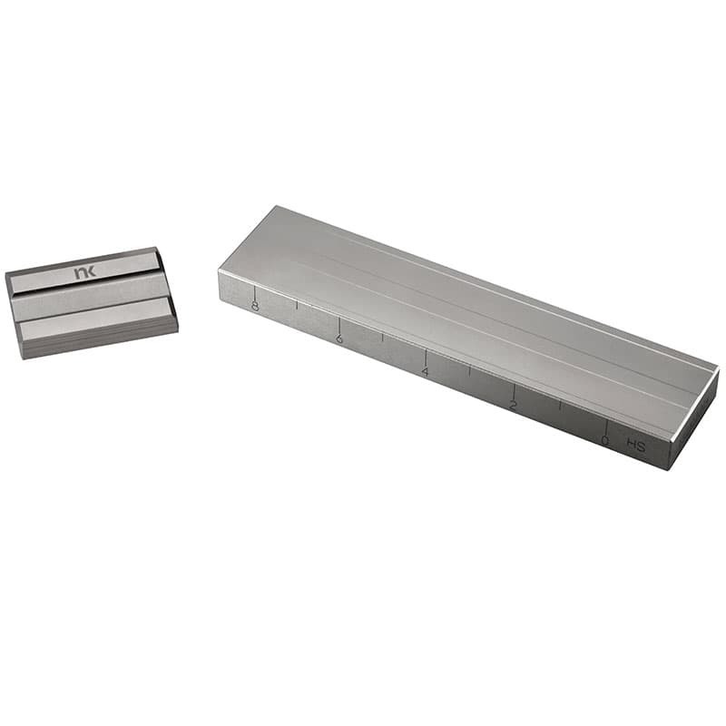 Stainless steel precision grindometer with dual measuring grooves, graduated scale and matching metal scraper.