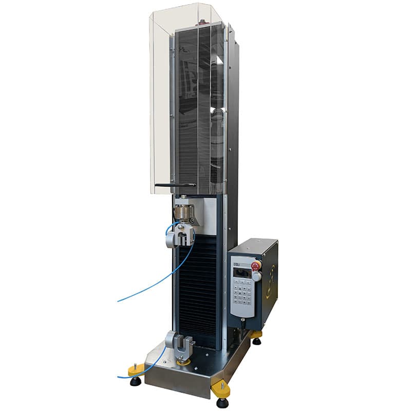 SYNTAX 5 compact 5 kN universal testing machine with test grips, controller and transparent safety guard.