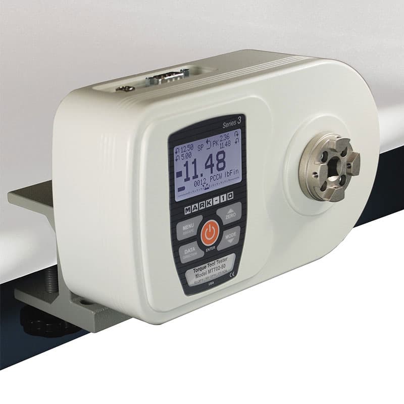 Series TT02 torque tool tester secured to a bench-mounted bracket.