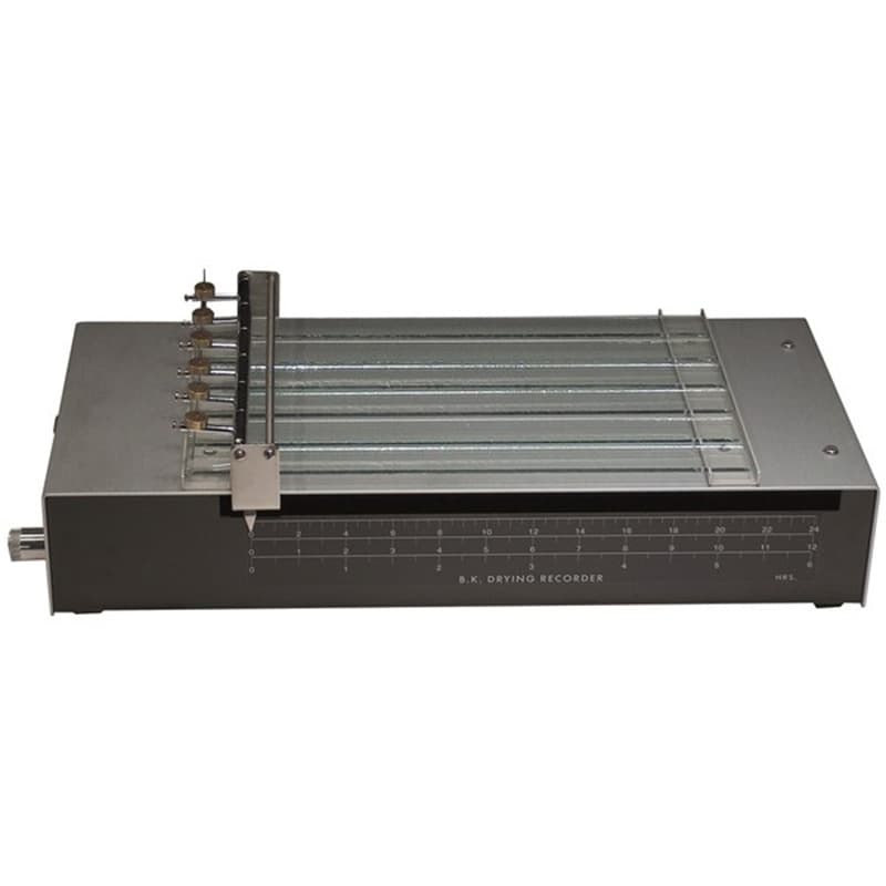 Drying time recorder with multiple parallel test tracks, movable needles, and a graduated time scale for evaluating paint and coating drying times.