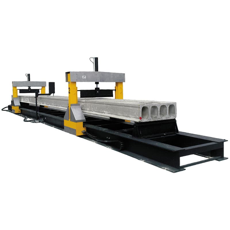 Multi-actuator test bench performing a full-scale flexural test on a precast concrete hollow-core slab using multiple loading frames along the specimen.