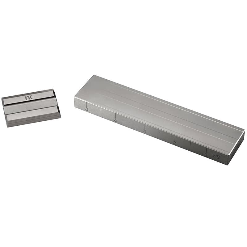 Stainless-steel Hegman Grindometer and scraper used to assess particle size, dispersion and fineness of grind in paints, coatings, inks and similar materials.