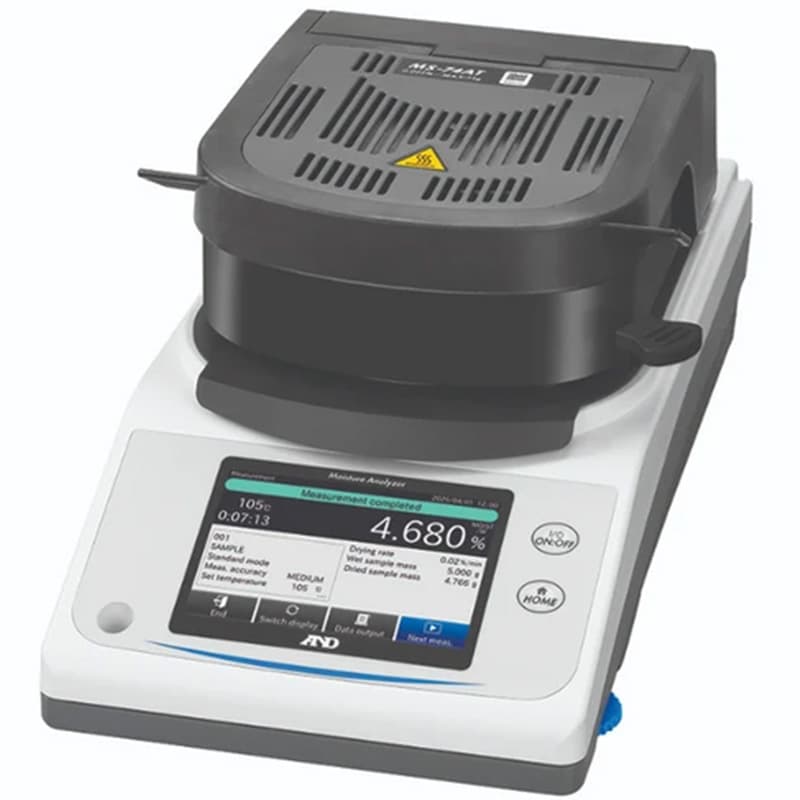 MS-74AT Moisture Analyser with integrated heating chamber and colour touchscreen for laboratory moisture content measurement.