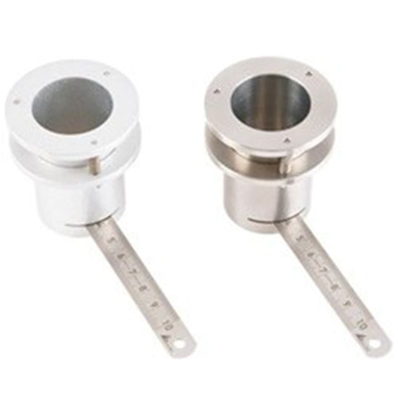 Two stainless steel Pfund Wet Film Thickness Gauges with circular measuring heads and graduated handles.