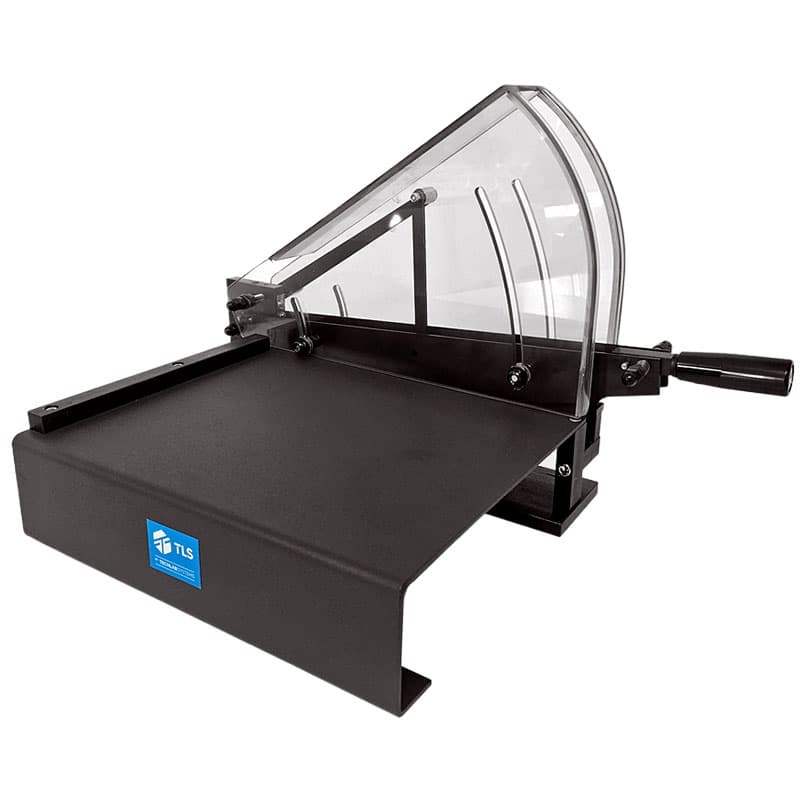 Front view of double-blade sample cutter with flat base, handle, and TLS logo.