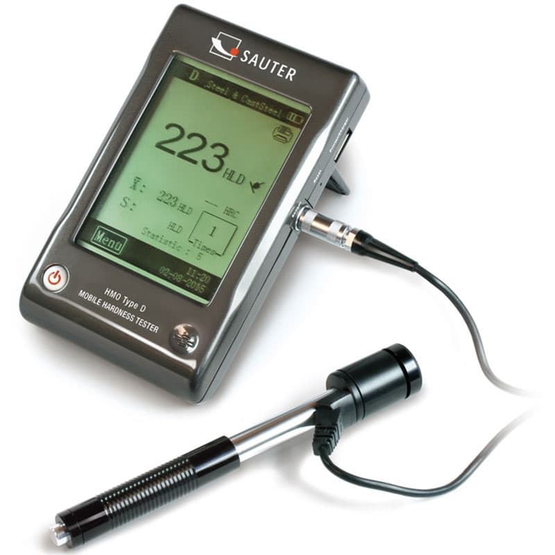 A Sauter mobile hardness tester showing a 223 HLD reading, with a connected probe and cable.