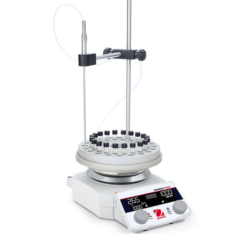 Magnetic stirrer equipped with a circular test tube holder and a temperature probe, designed for multi-sample applications.