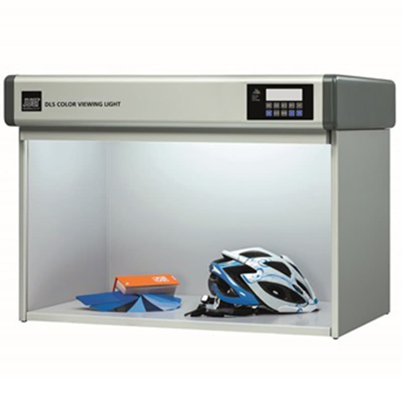 DLS V8 Colour Assessment Cabinet with colour samples and cycling helmet in the illuminated viewing area.