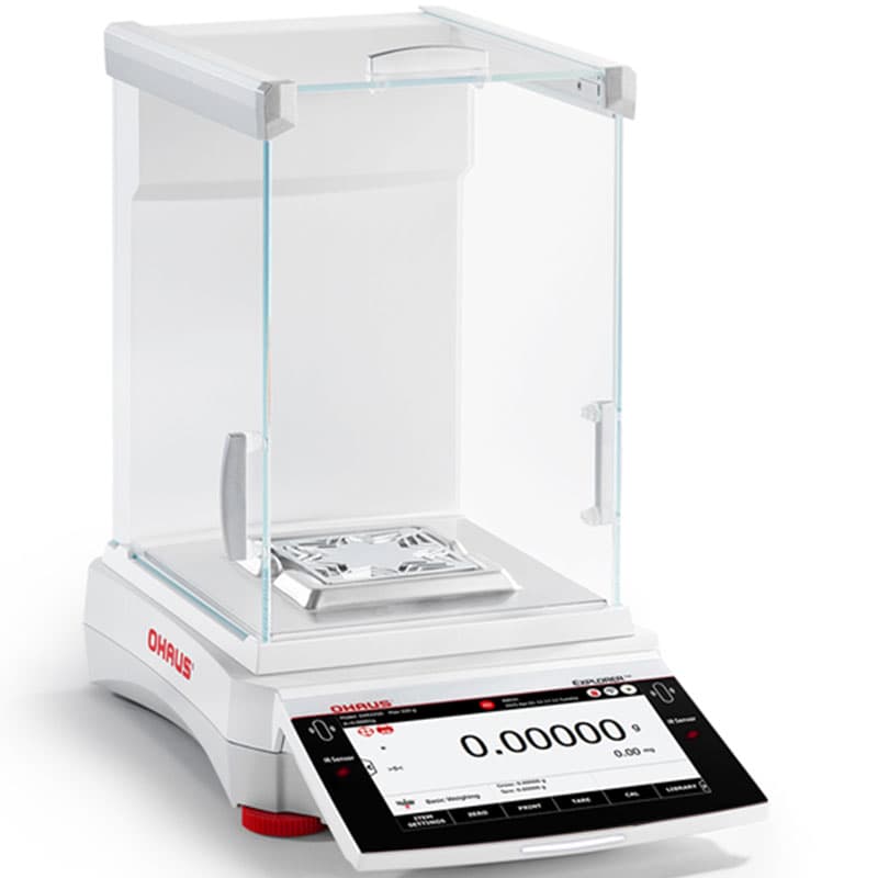 Side-angled view of the OHAUS Explorer Semi-Micro EXR balance with its glass draft shield, stainless steel weighing pan and touchscreen displaying 0.00000 g.