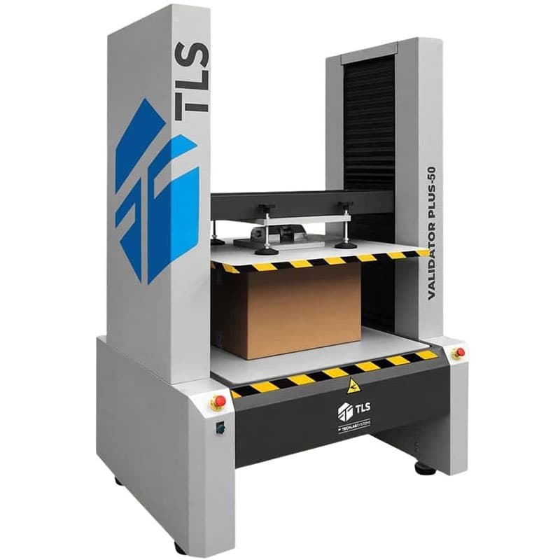 VALIDATOR PLUS-50 Box Compression Tester from an angled view, compressing a cardboard box on the test platform.