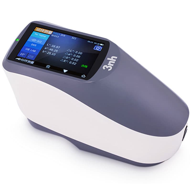Handheld spectrophotometer displaying colour measurement data on a touchscreen.