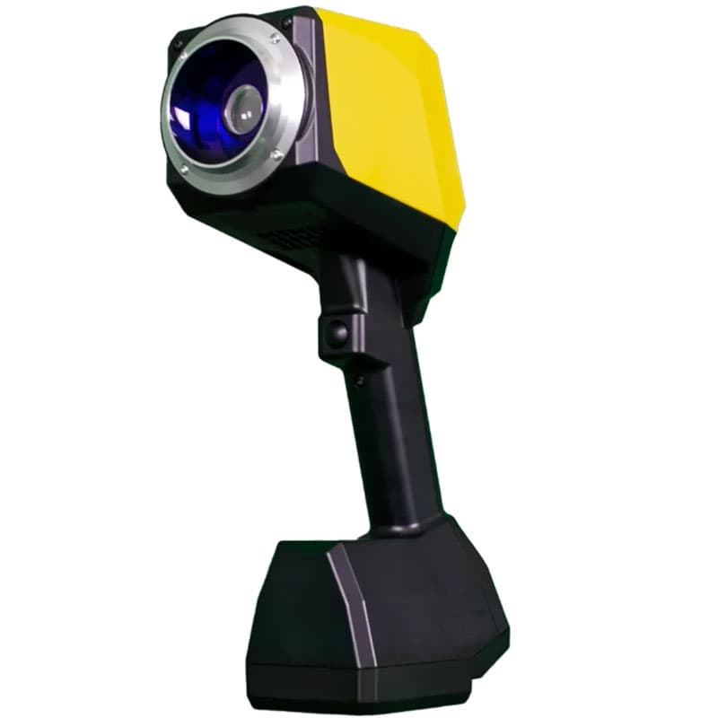 TQC Sheen Coatmaster Flex handheld coating thickness gauge with yellow housing and large front optical lens shown at an angled front view.