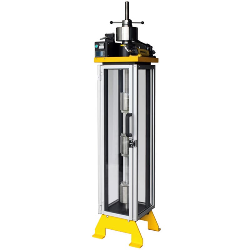 Hydraulic tensile creep testing machine with an enclosed vertical test chamber, specimen grips, hydraulic loading system, and control unit.